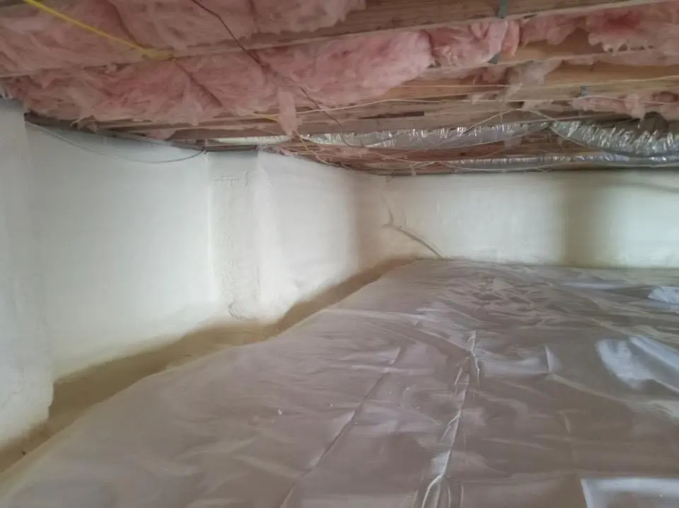 Crawl space encapsulation with closed-cell spray foam for Commercial Roof Restoration in Hillsdale